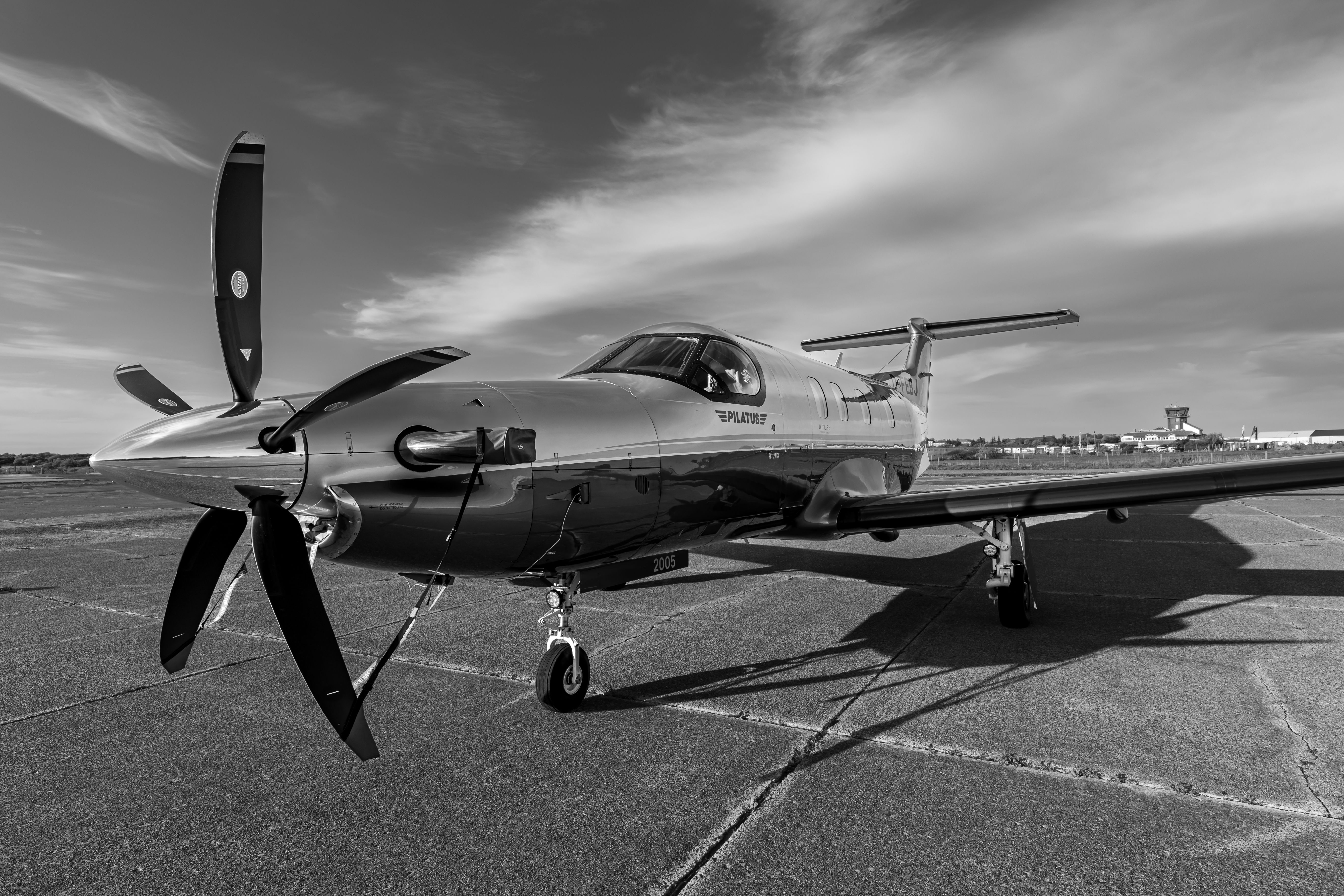 Pilatus aircraft parked on airport ramp